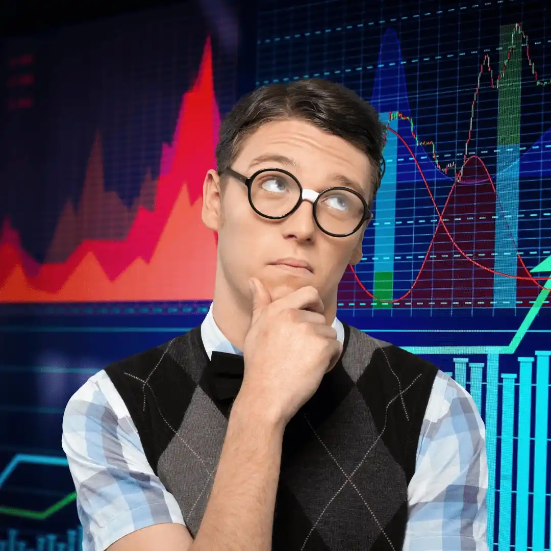 Man looking at colorful growth charts and graphs on a dark background with upward trending lines